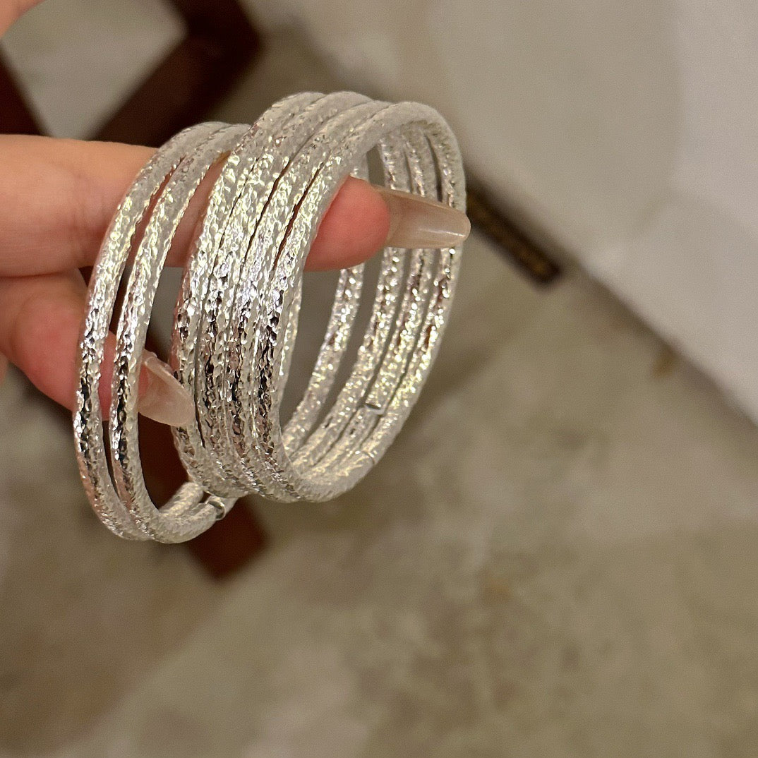 OMNAGAR “Hammered Radiance” 999 Fine Silver Bangle